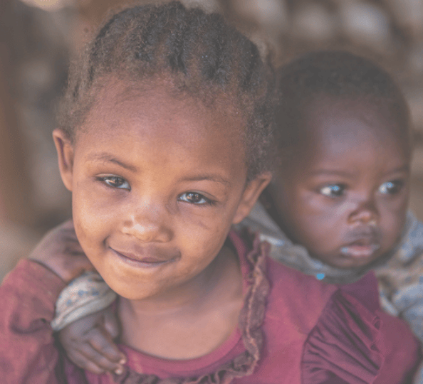 Child carrying sibling Child carrying sibling