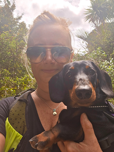Louise and her miniature dachshund Cooper Louise and her miniature dachshund Cooper